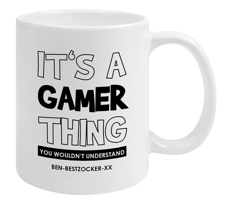 Weiße Tasse mit dem Spruch „It's a Gamer Thing – you wouldn't understand“ und Gamertag
