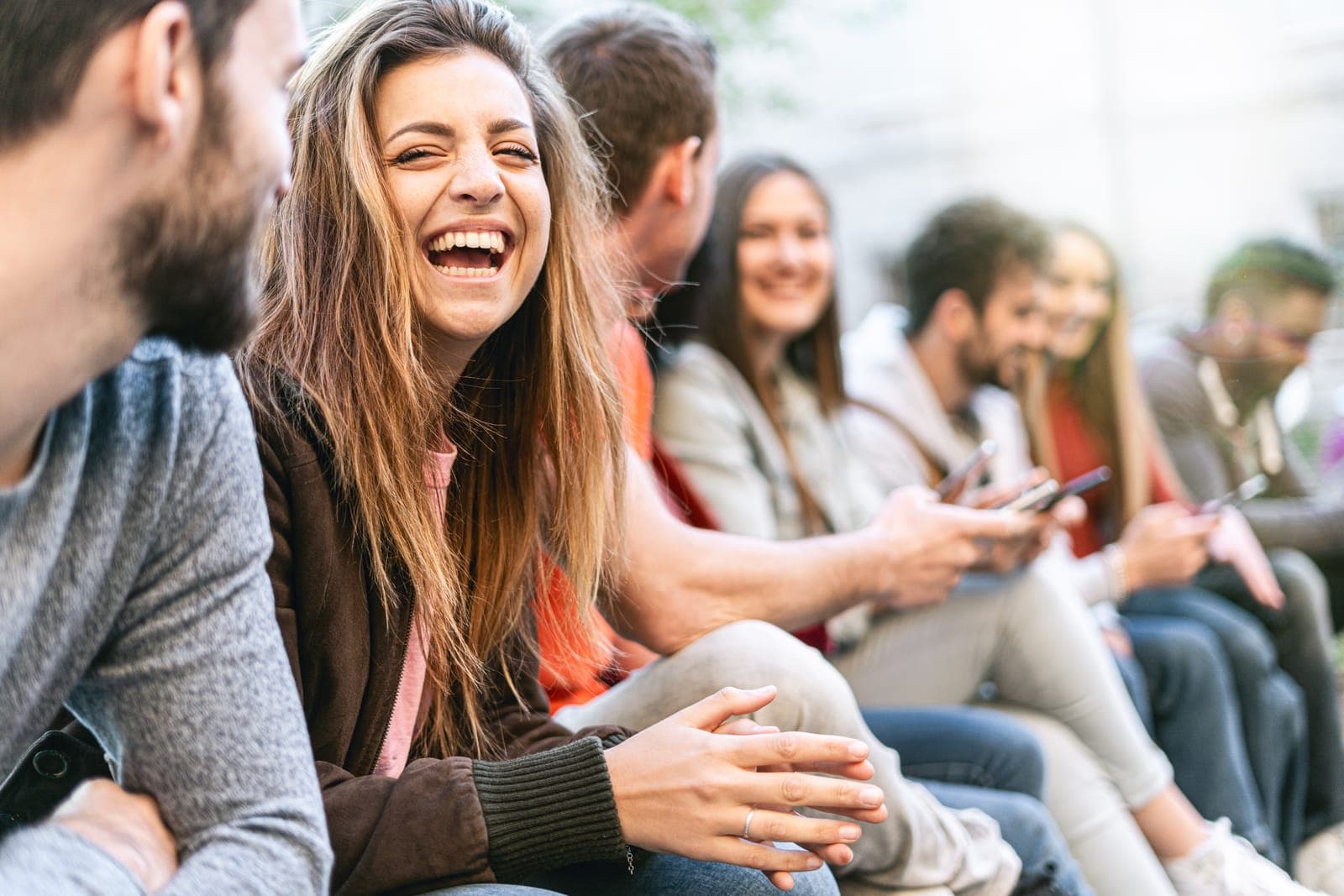 Students sitting together and laughing
